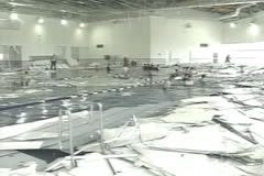 SWIMMING POOL ROOF COLLAPSES DURING JAPAN EARTHQUAKE - Film & Video Stock