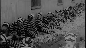 Prisoners In Striped Uniforms Break Rocks Hd Film Video Stock